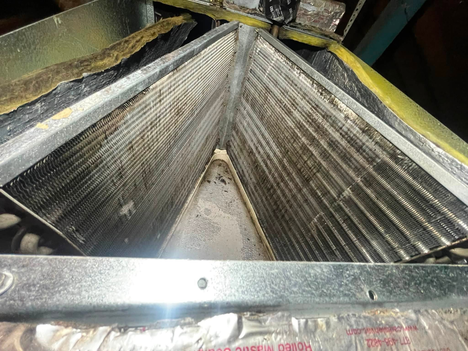 Dirty evaporator coil before a First Choice HVAC cleaning